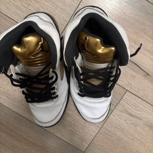 gold white and black. Stylish  comfortable and well made tennis shoes